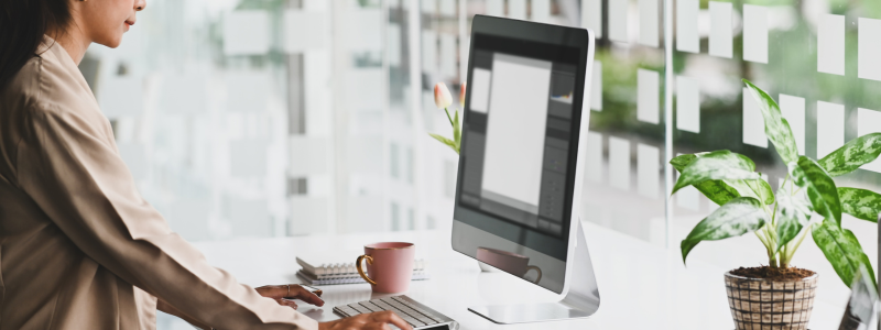Female real estate agent using computer