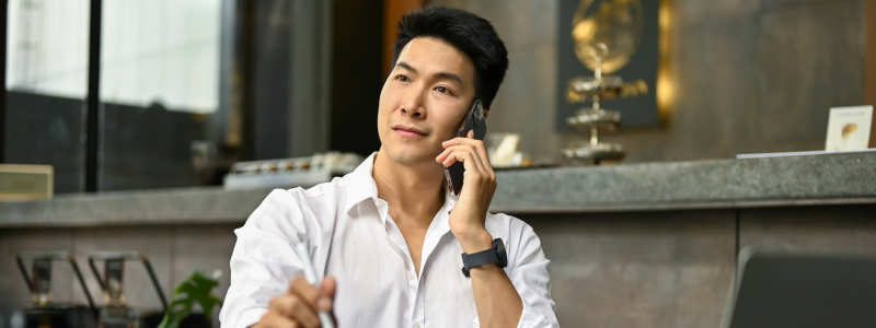 Real estate agent on the phone following up with prospects