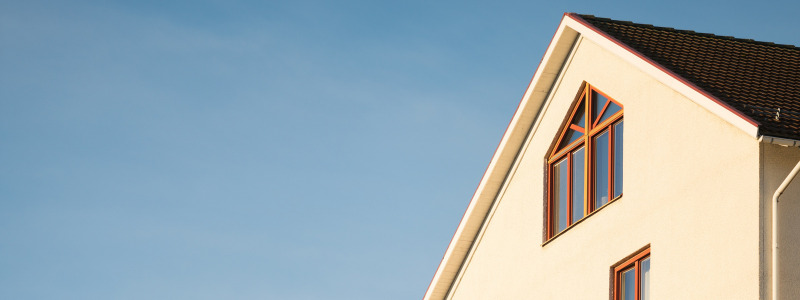 Image of a house against a blue sky | Increased brokerage margins