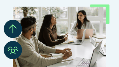 real estate agents talking around brokerage table | grow your real estate brokerage