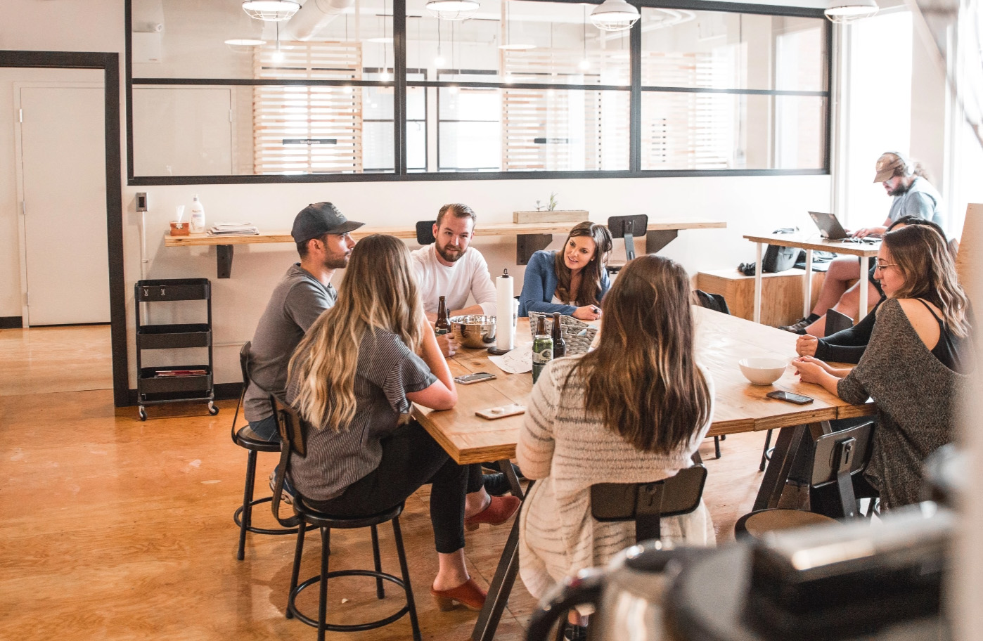 real estate team working together around a table