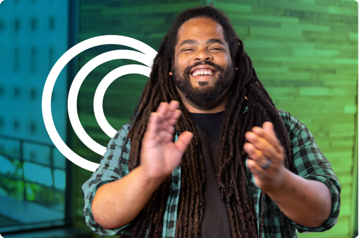 real estate proptech employee chris gunn from moxiworks clapping and smiling